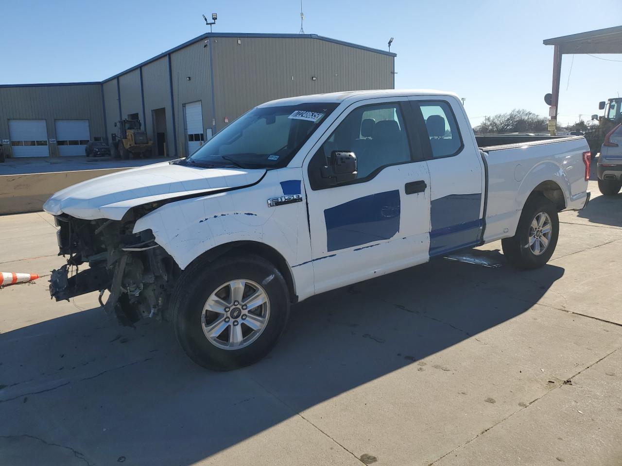 2015 Ford F150 Super Cab Blue vin: 1FTEX1C87FKD85188 Damage: Left Front Fender, Cracked Paint, > 12 Inches