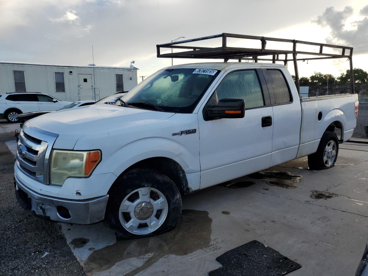 2010 Ford F150 Super Cab White vin: 1FTEX1C89AFC45516 Damage: Roof Luggage Rack, Aftermarket, Acceptable