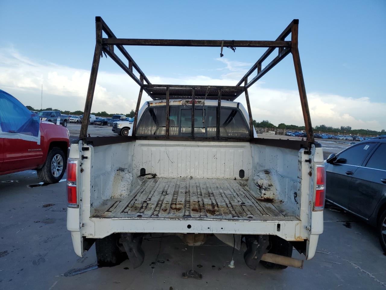 2010 Ford F150 Super Cab White vin: 1FTEX1C89AFC45516 Damage: Tailgate, Missing, Replacement Required