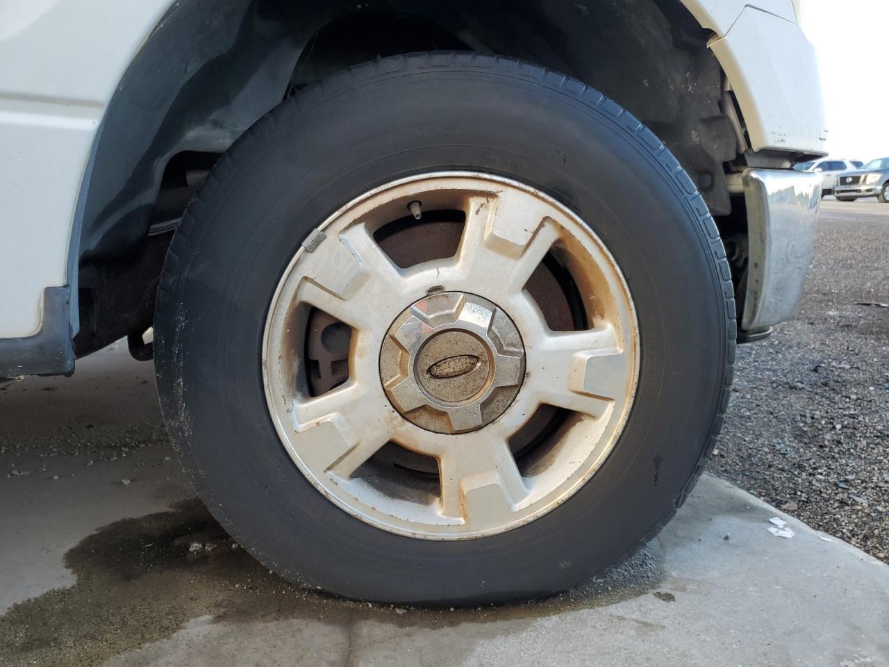 2010 Ford F150 Super Cab White vin: 1FTEX1C89AFC45516 Damage: Right Front Wheel, Curb Rash, 2 to 3 inches