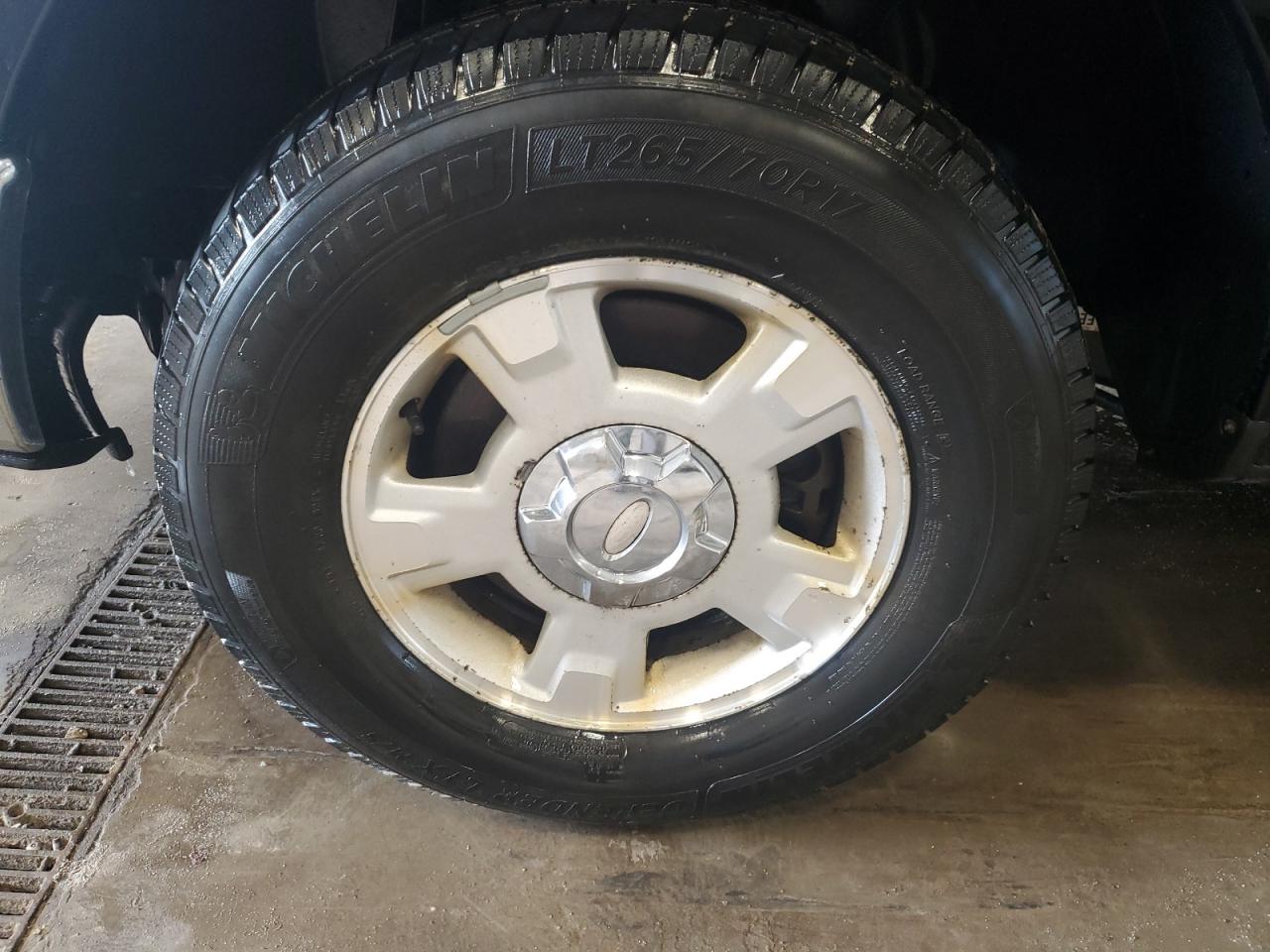 2012 Ford F150 Super Cab Black vin: 1FTEX1CM1CKE38752 Damage: Left Front Wheel, Curb Rash, 2 to 3 inches