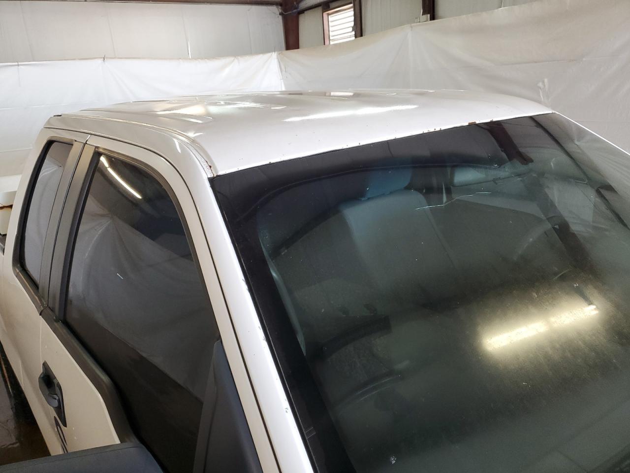 2011 Ford F150 Super Cab White vin: 1FTEX1CM9BFC21781 Damage: Roof, Chipped, 6