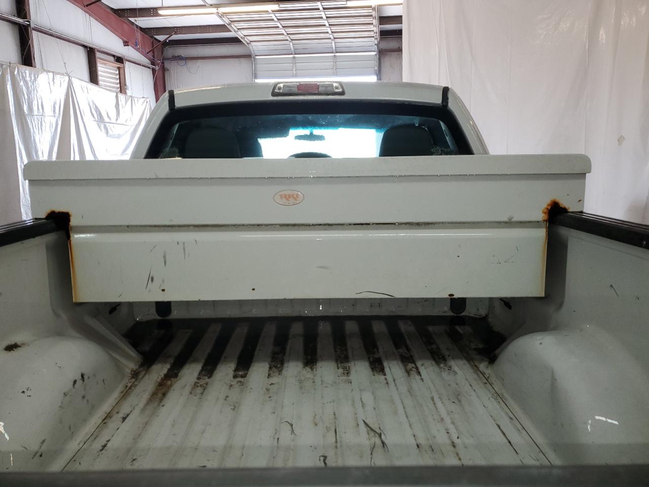 2011 Ford F150 Super Cab White vin: 1FTEX1CM9BFC21781 Damage: Left Tool Box, Rust, 5 To 6 Inches