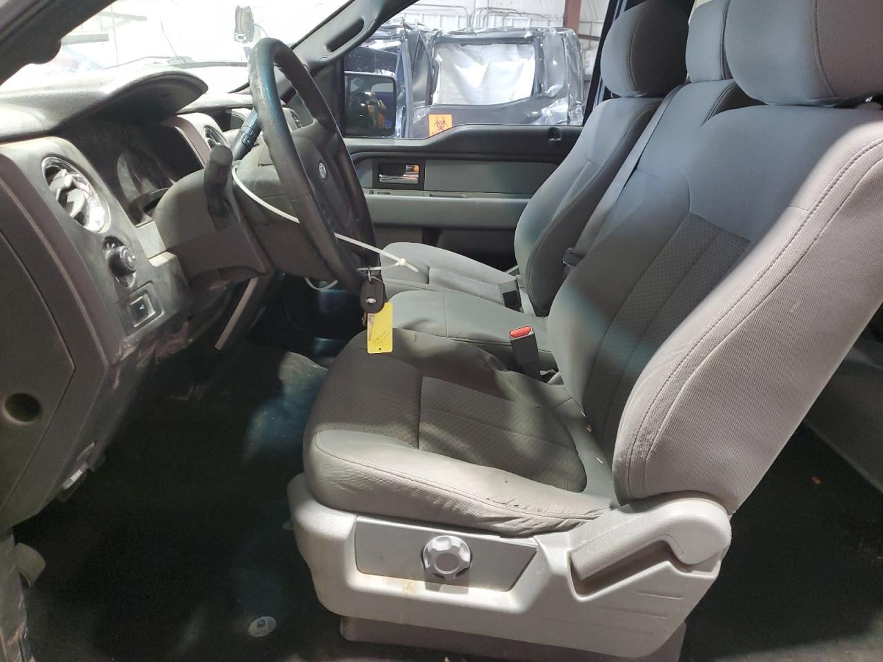 2014 Ford F150 Super Cab White vin: 1FTEX1EM4EKD18167 Damage: Left Front Seat Cushion, Torn, 1/2 To 1 Inch