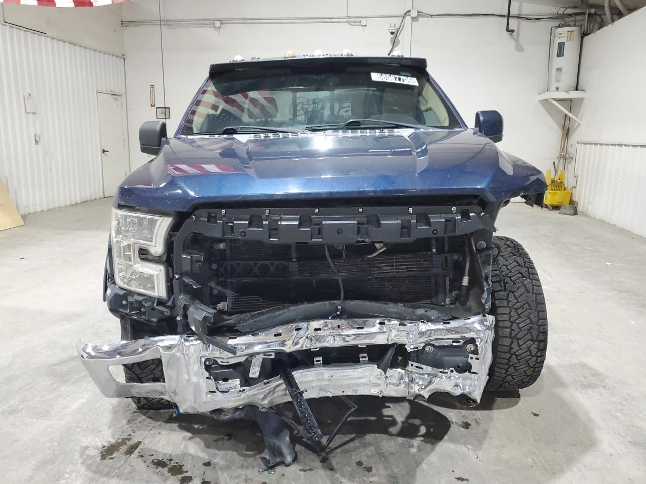 2015 Ford F150 Super Cab Blue vin: 1FTEX1EP4FFA54758 Damage: Grille, Broken, Replacement Required