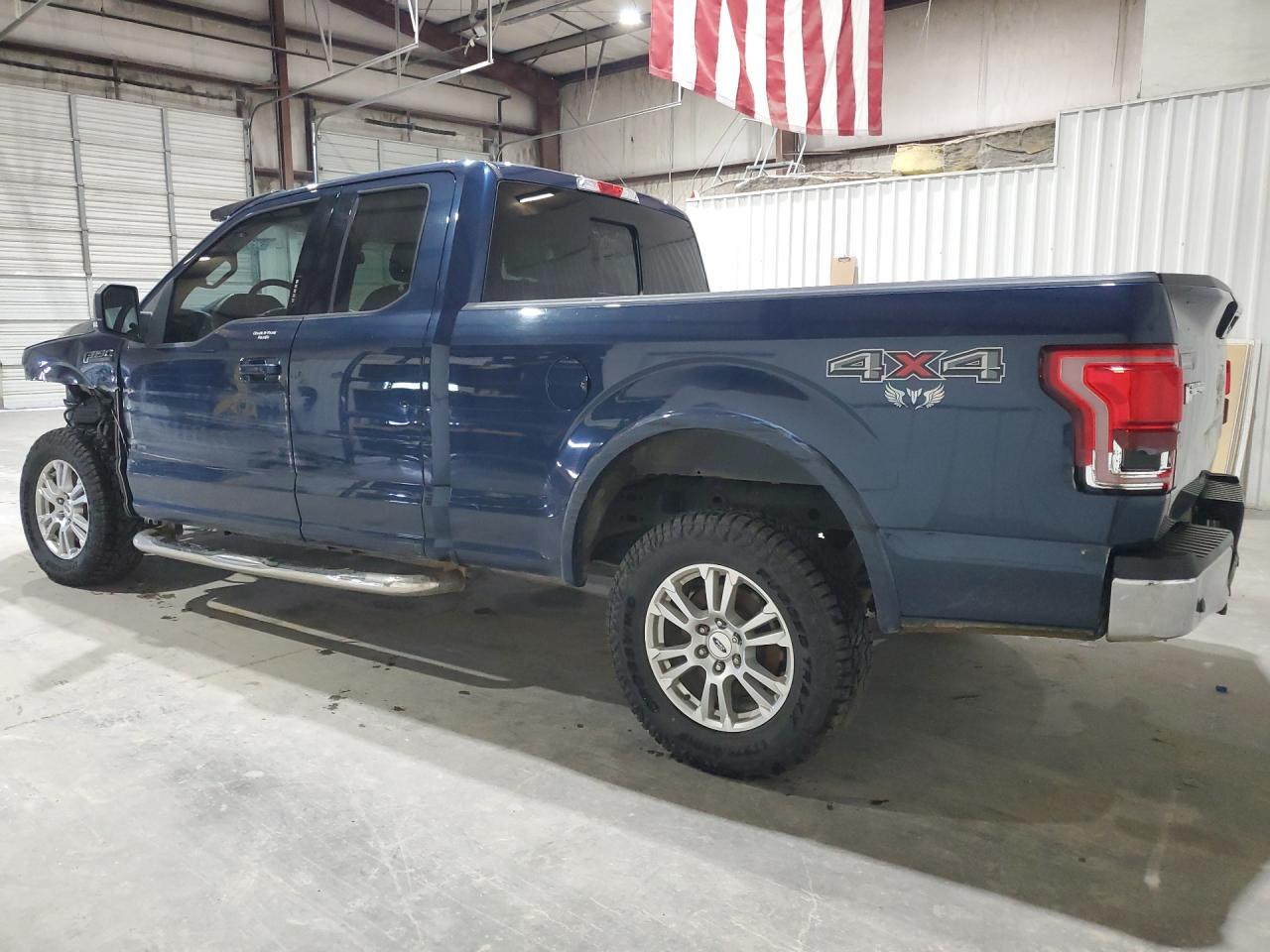 2015 Ford F150 Super Cab Blue vin: 1FTEX1EP4FFA54758 Damage: Left Tail Light, Broken, Replacement Required