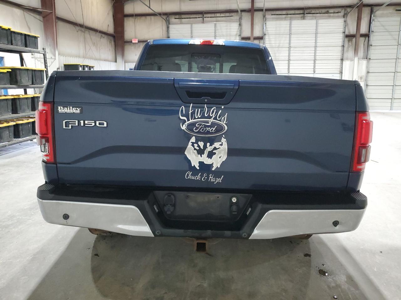 2015 Ford F150 Super Cab Blue vin: 1FTEX1EP4FFA54758 Damage: Rear Metal Bumper Chrome, Dent(S) W/No Paint Dmg, 5 To 6 Inches
