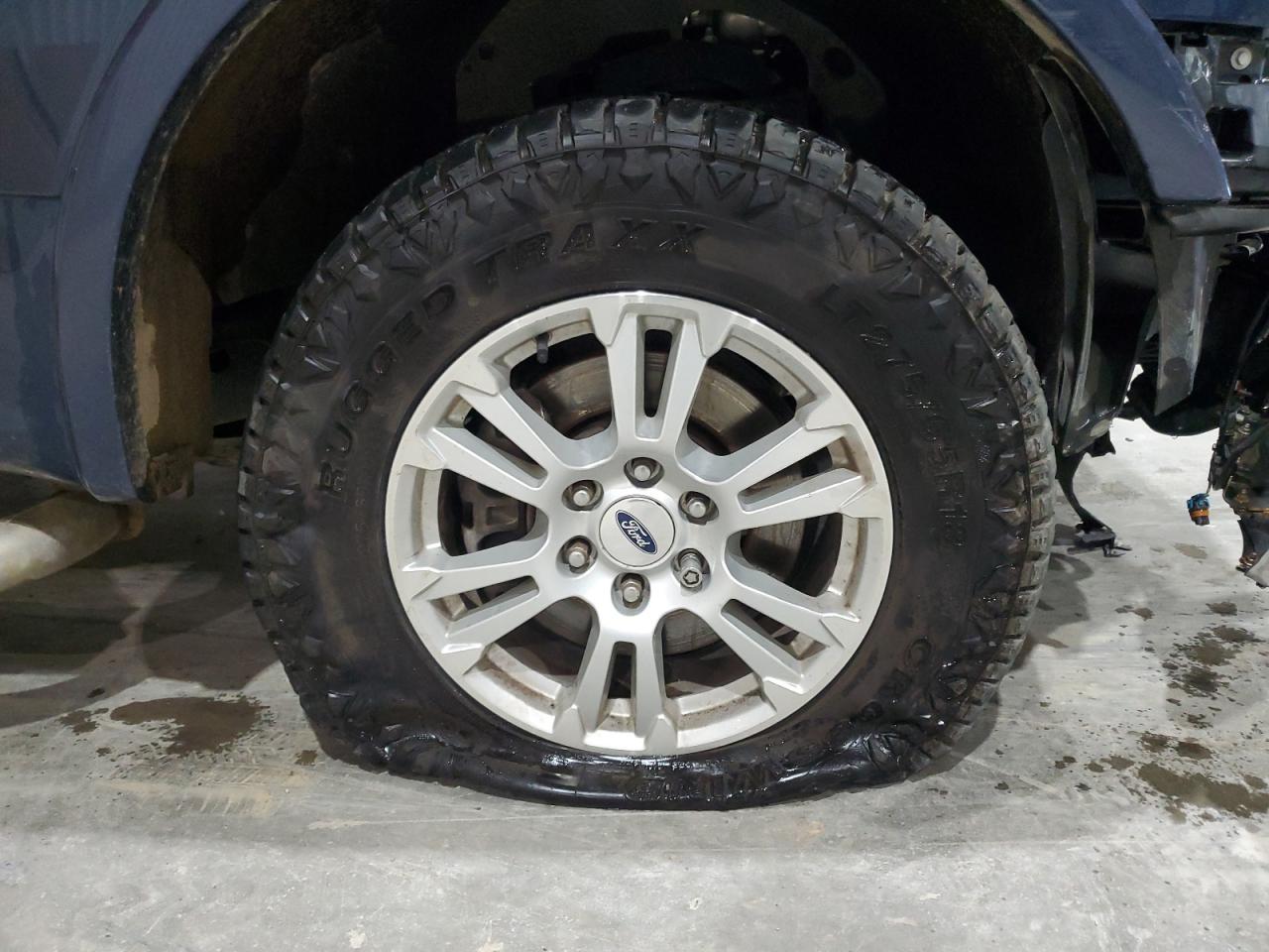 2015 Ford F150 Super Cab Blue vin: 1FTEX1EP4FFA54758 Damage: Right Front Tire, Cut, Replacement Required