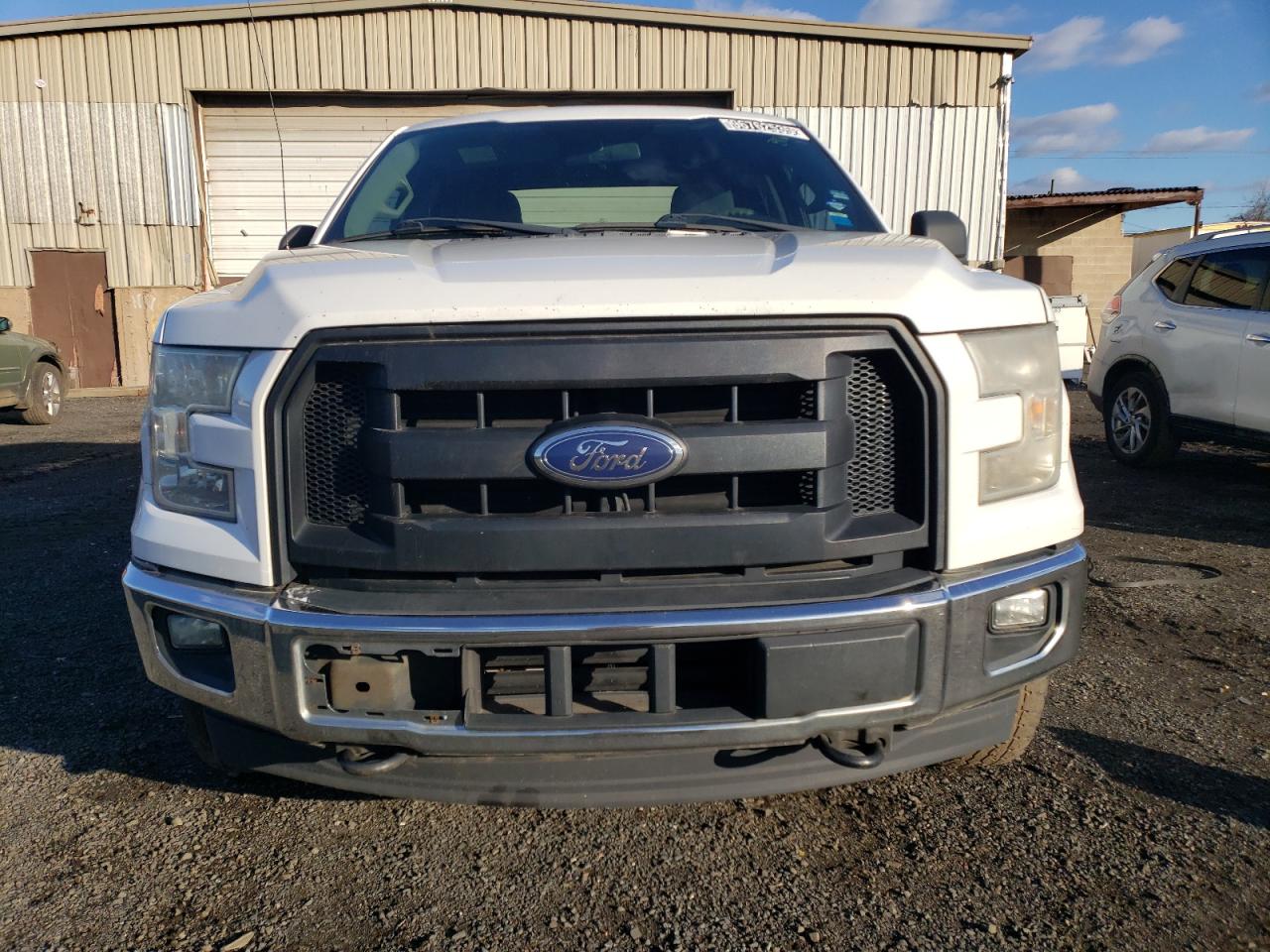 2015 Ford F150 Super Cab White vin: 1FTEX1EPXFFC01665 Damage: Left Head Lamp, Faded, Repair Required