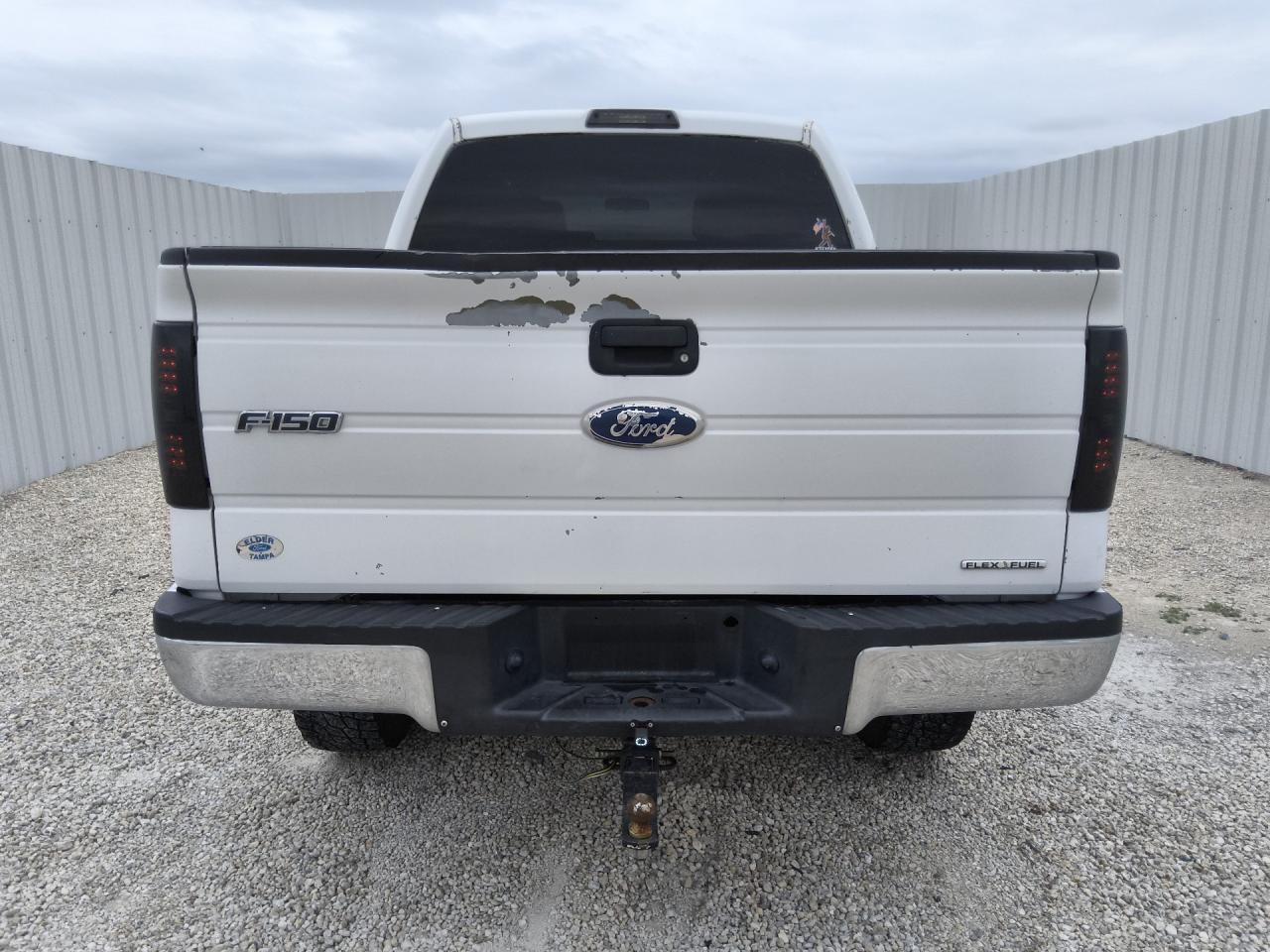 2012 Ford F150 Supercrew White vin: 1FTFW1CF1CKD59588 Damage: Right Tail Light, Aftermarket, Acceptable