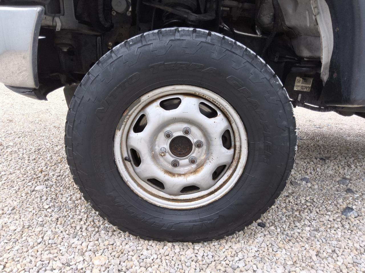2012 Ford F150 Supercrew White vin: 1FTFW1CF1CKD59588 Damage: Left Front Wheel, Corrosion, > 12 Inches