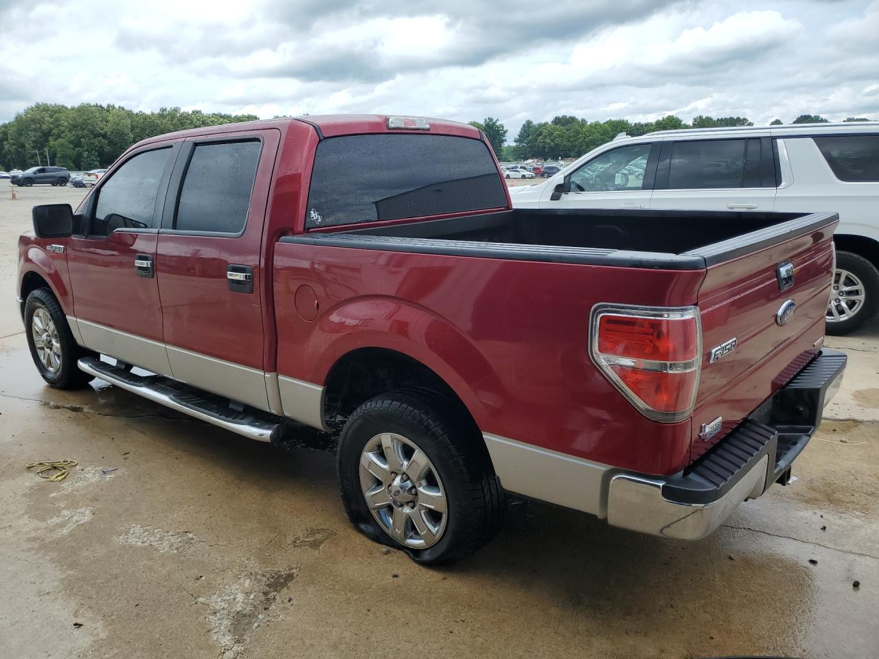 2013 Ford F150 Supercrew Red vin: 1FTFW1CF4DKF59141 Damage: Left Rear Tire, Separated, Replacement Required