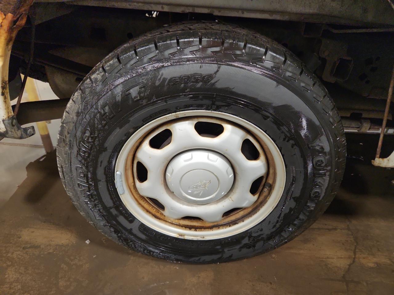 2013 Ford F150 Supercrew White vin: 1FTFW1CF7DKD83928 Damage: Right Rear Wheel, Corrosion, > 12 Inches