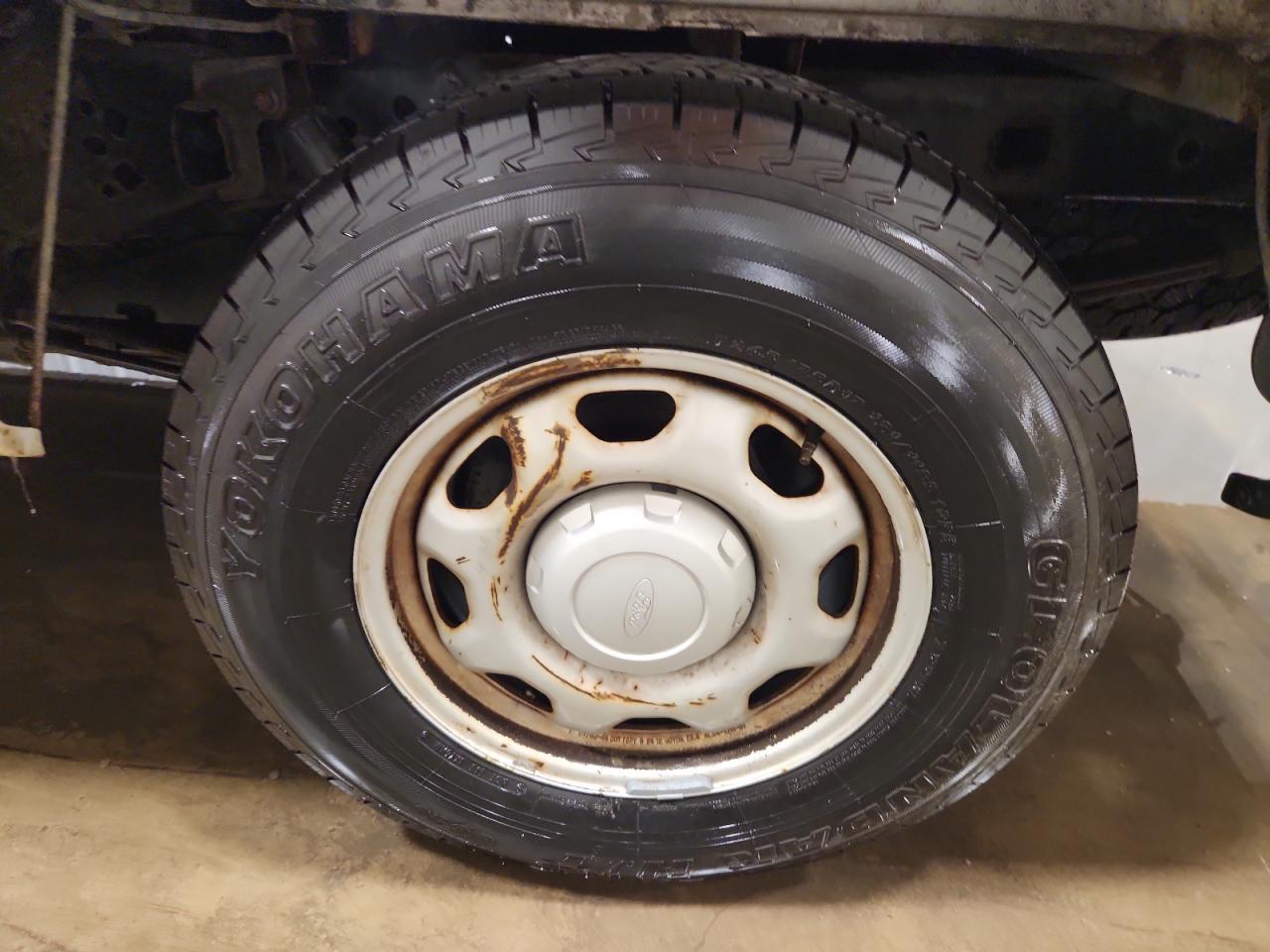 2013 Ford F150 Supercrew White vin: 1FTFW1CF7DKD83928 Damage: Left Rear Wheel, Heavy Scratch, > 12 Inches