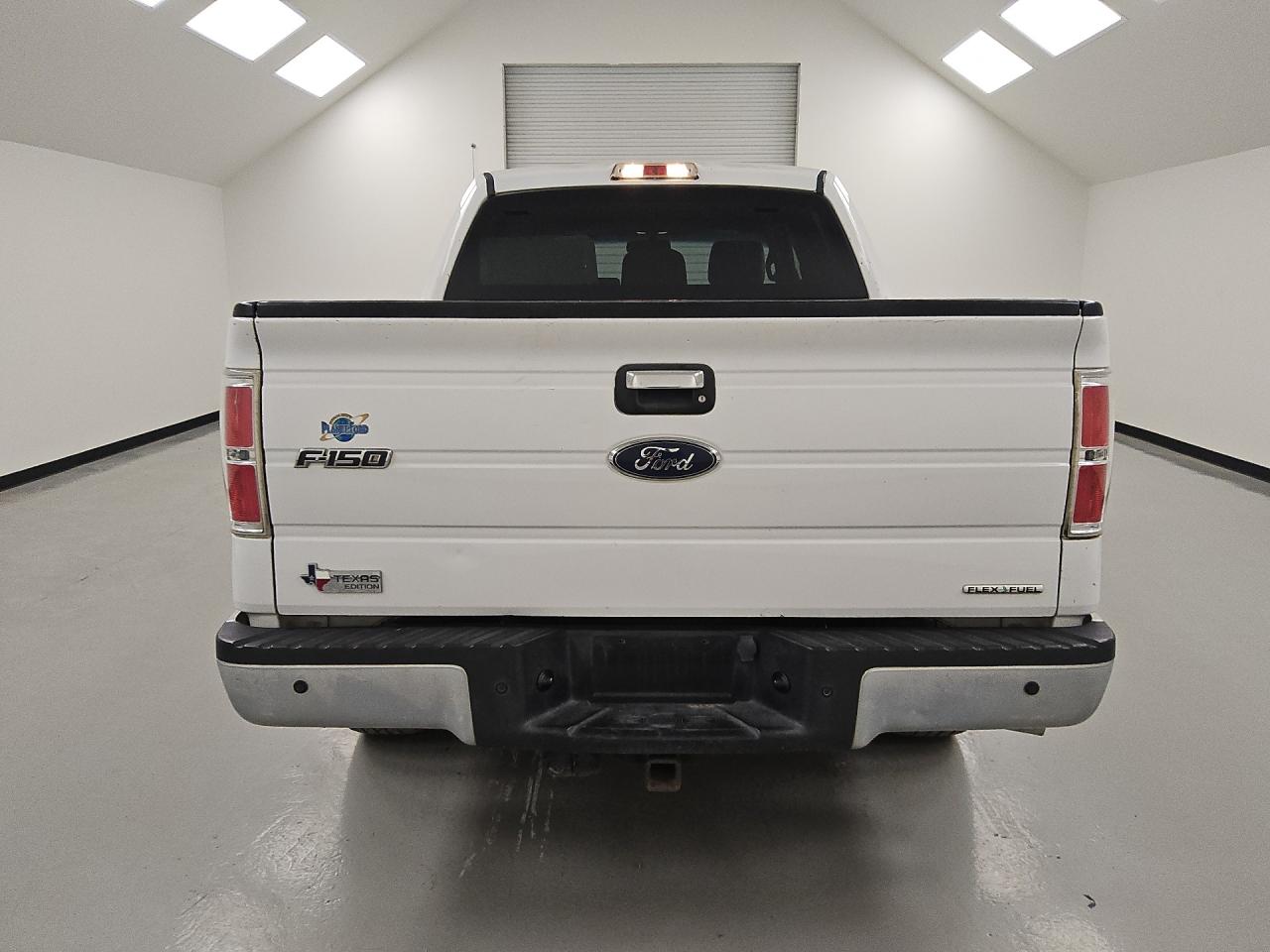 2012 Ford F150 Supercrew White vin: 1FTFW1CF9CFC40129 Damage: Tailgate, Dent(S) W/ Paint Dmg, 1 To 2 Inches