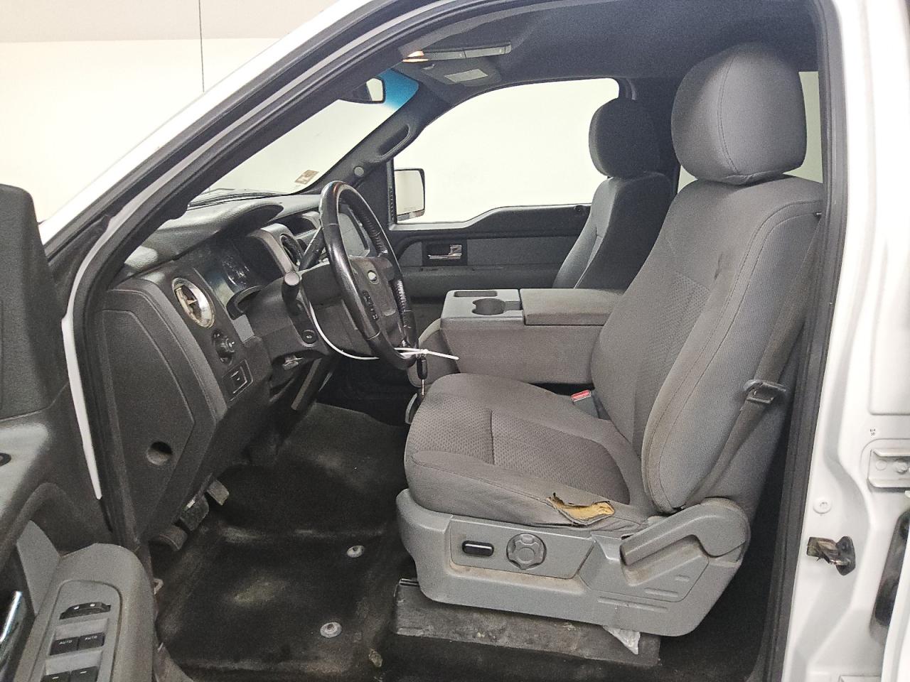 2012 Ford F150 Supercrew White vin: 1FTFW1CF9CFC40129 Damage: Left Front Seat, Torn, 1 To 2 Inches