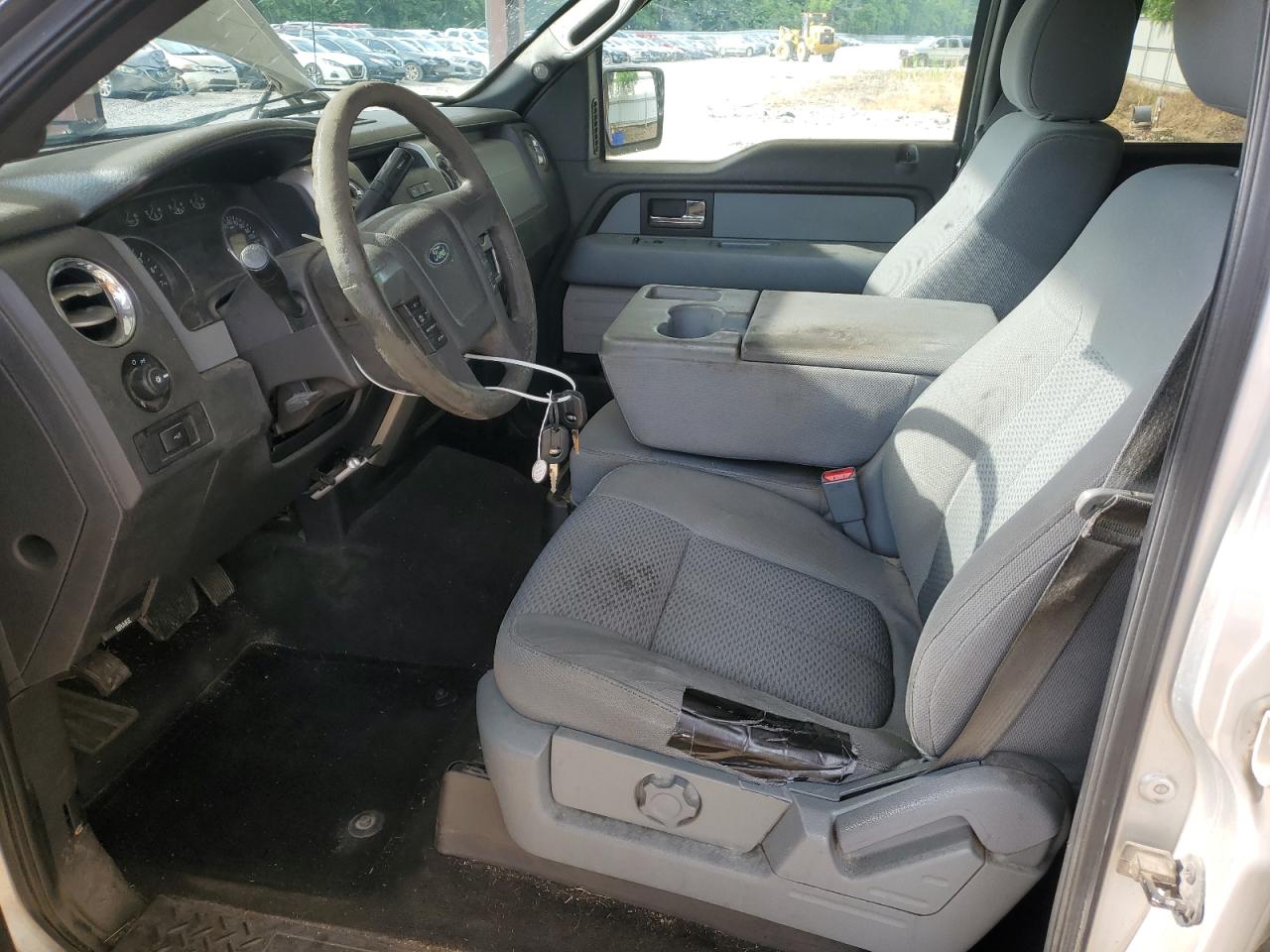 2013 Ford F150 Supercrew Silver vin: 1FTFW1CFXDFA93658 Damage: Left Front Seat, Torn, 7 To 8 Inches