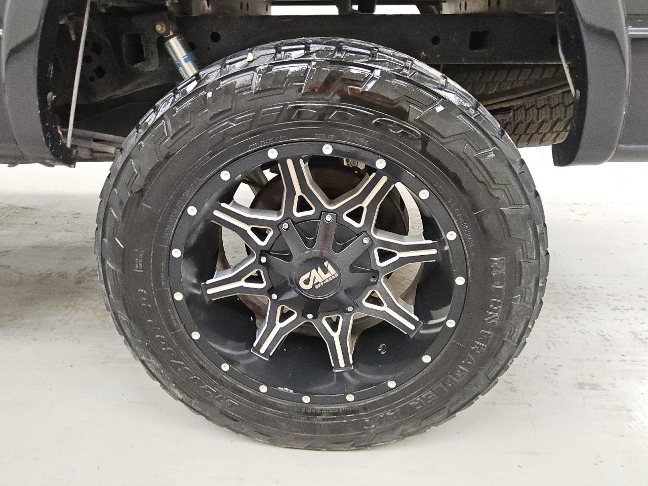 2013 Ford F150 Supercrew Black vin: 1FTFW1CT7DKD95096 Damage: Left Rear Wheel, Aftermarket, Acceptable