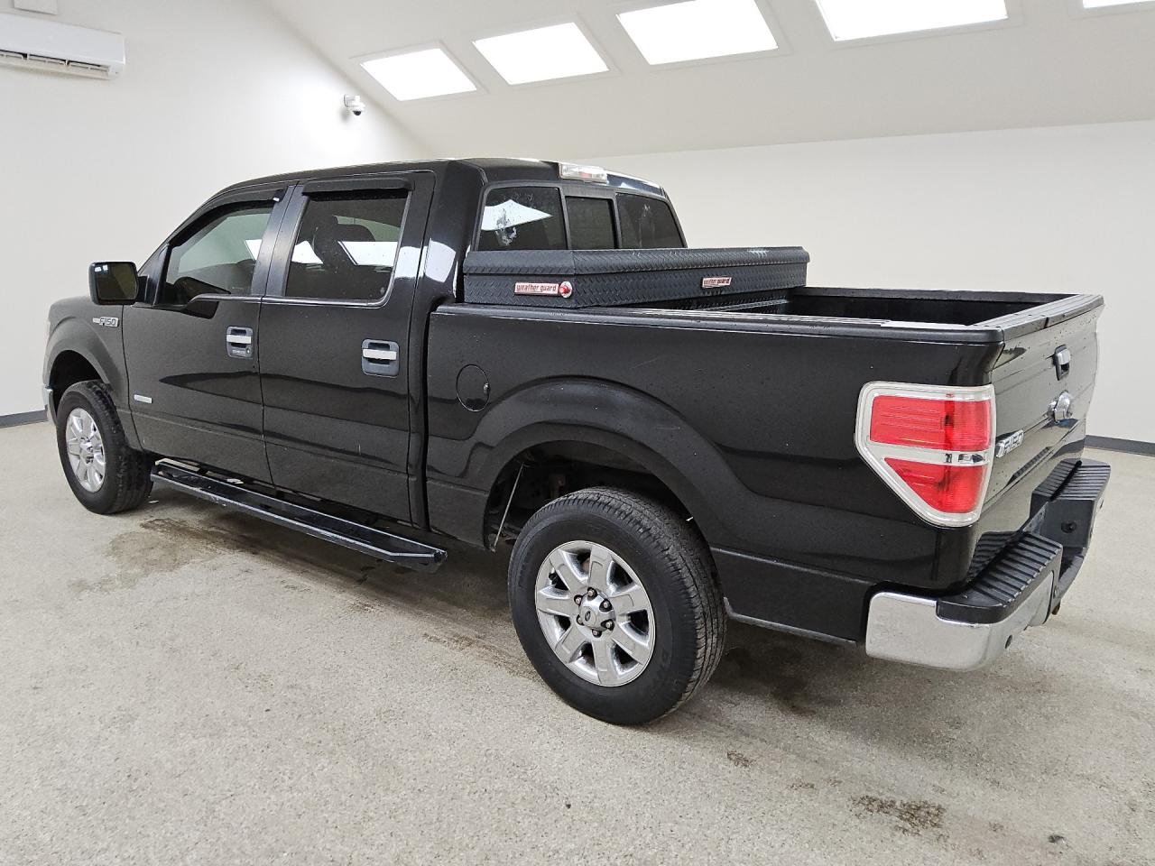 2014 Ford F150 Supercrew Black vin: 1FTFW1CTXEKD06848 Damage: Left Rear Door, Chipped, 4