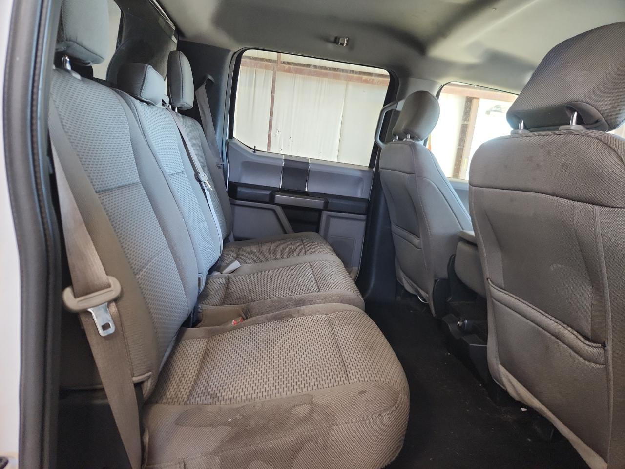 2019 Ford F150 Supercrew White vin: 1FTFW1E47KFD22175 Damage: Right Rear Seat Cushion, Stained, Permanent