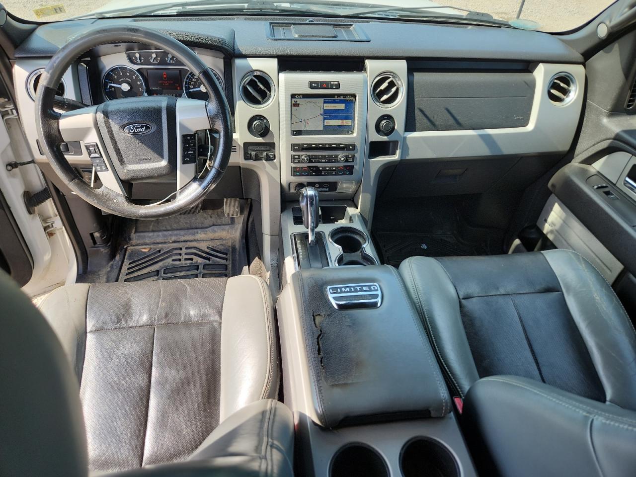 2011 Ford F150 Supercrew White vin: 1FTFW1E67BFA47022 Damage: Console Cover, Torn, 5 To 6 Inches