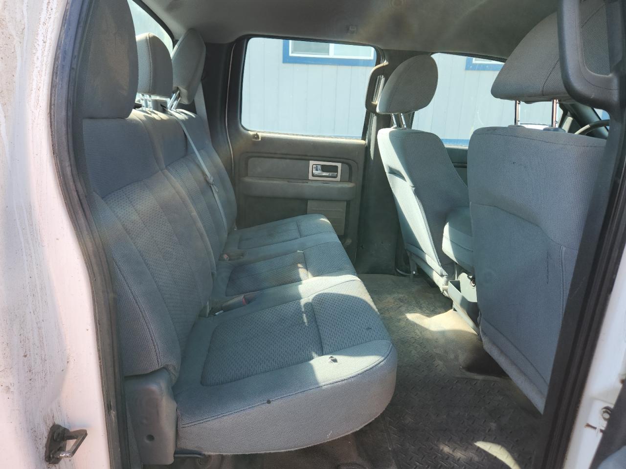 2011 Ford F150 Supercrew White vin: 1FTFW1EF0BFD31222 Damage: Right Rear Seat Cushion, Hole(S), 2 To 3 Inches