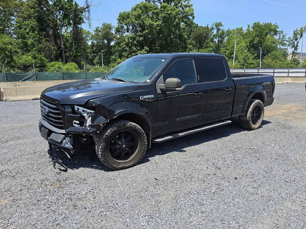 2015 Ford F150 Supercrew Black vin: 1FTFW1EF1FFC00158 Damage: Left Front Fender, Dent(S) W/ Paint Dmg, 7 To 8 Inches