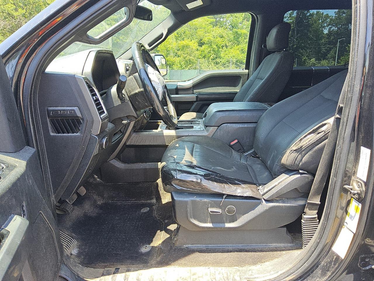 2015 Ford F150 Supercrew Black vin: 1FTFW1EF1FFC00158 Damage: Left Front Seat, Worn, Replacement Required