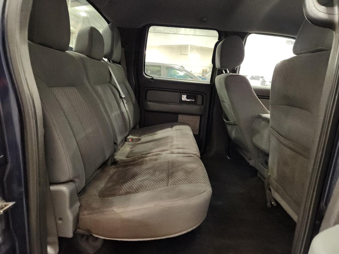 2012 Ford F150 Supercrew Blue vin: 1FTFW1EF2CFC43810 Damage: Right Rear Seat Cushion, Stained, Permanent