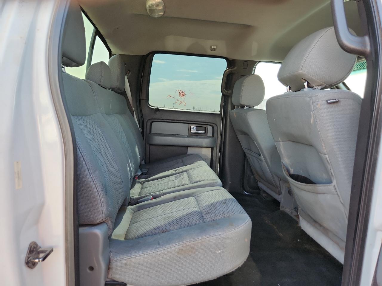 2013 Ford F150 Supercrew White vin: 1FTFW1EF3DFE07101 Damage: Right Rear Seat, Stained, Permanent