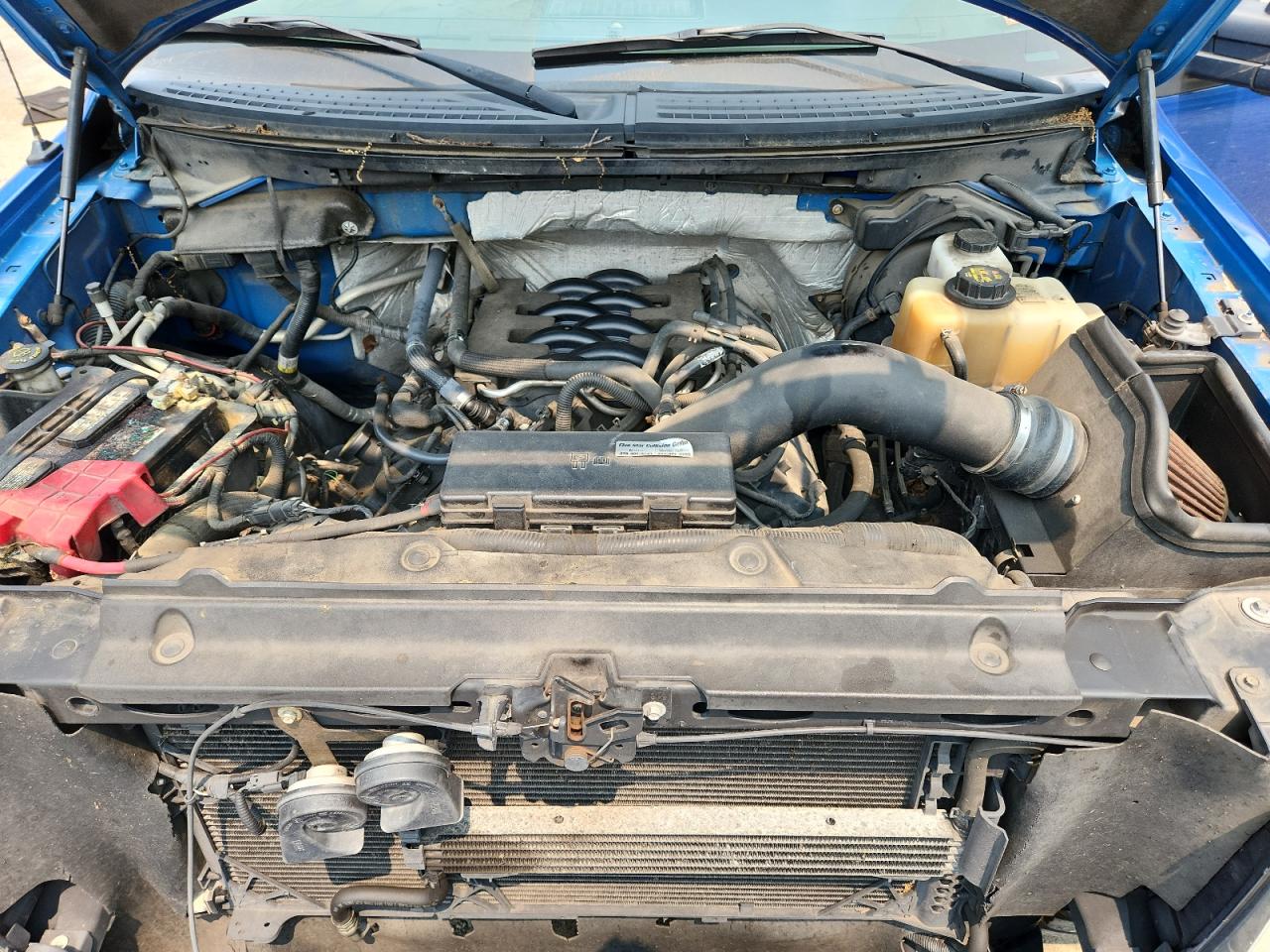 2011 Ford F150 Supercrew Blue vin: 1FTFW1EF5BFC44058 Damage: Air Filter Element, Aftermarket, Acceptable