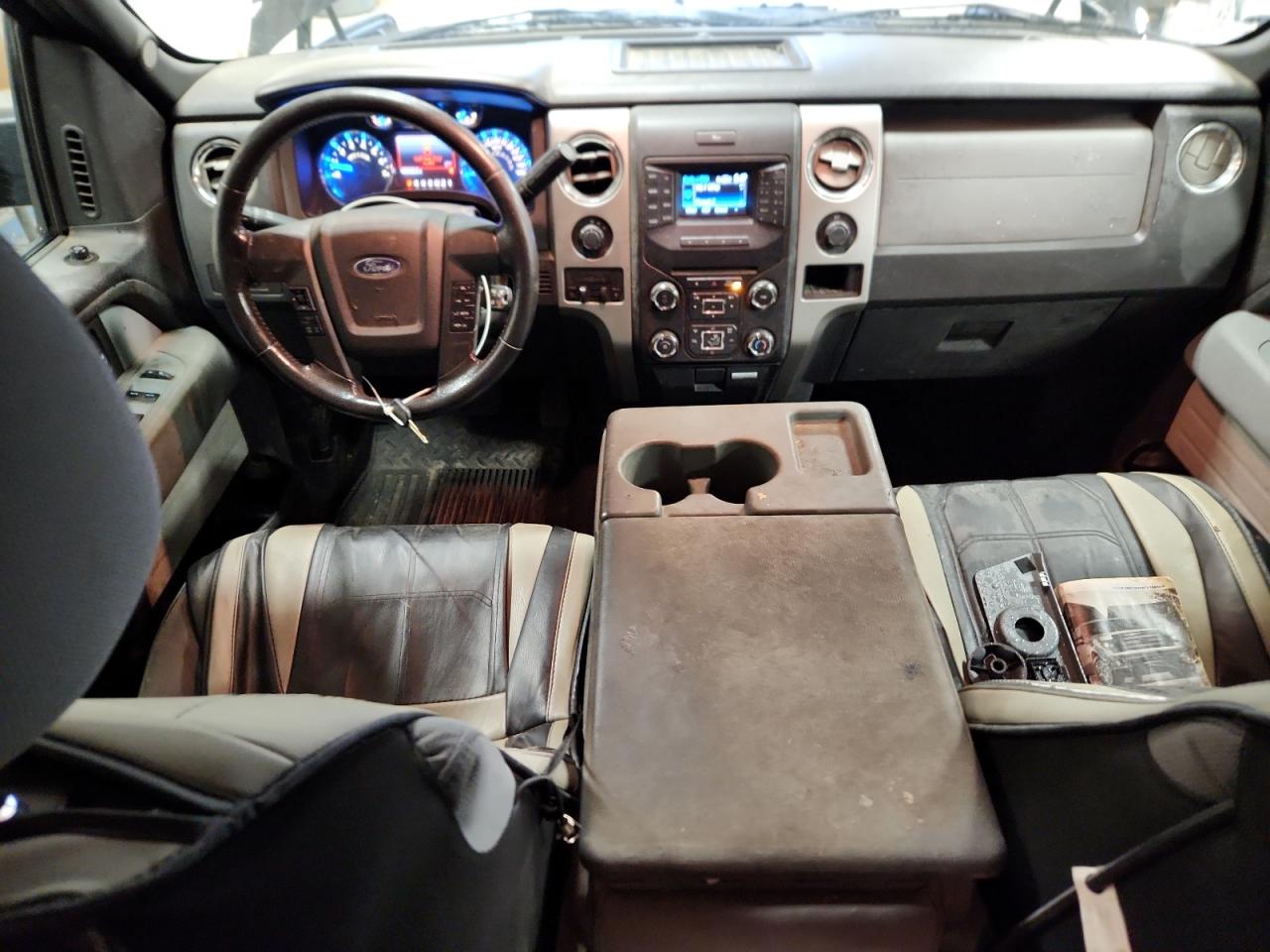 2013 Ford F150 Supercrew Black vin: 1FTFW1EF5DFB86262 Damage: Front Center Armrest, Stained, Permanent