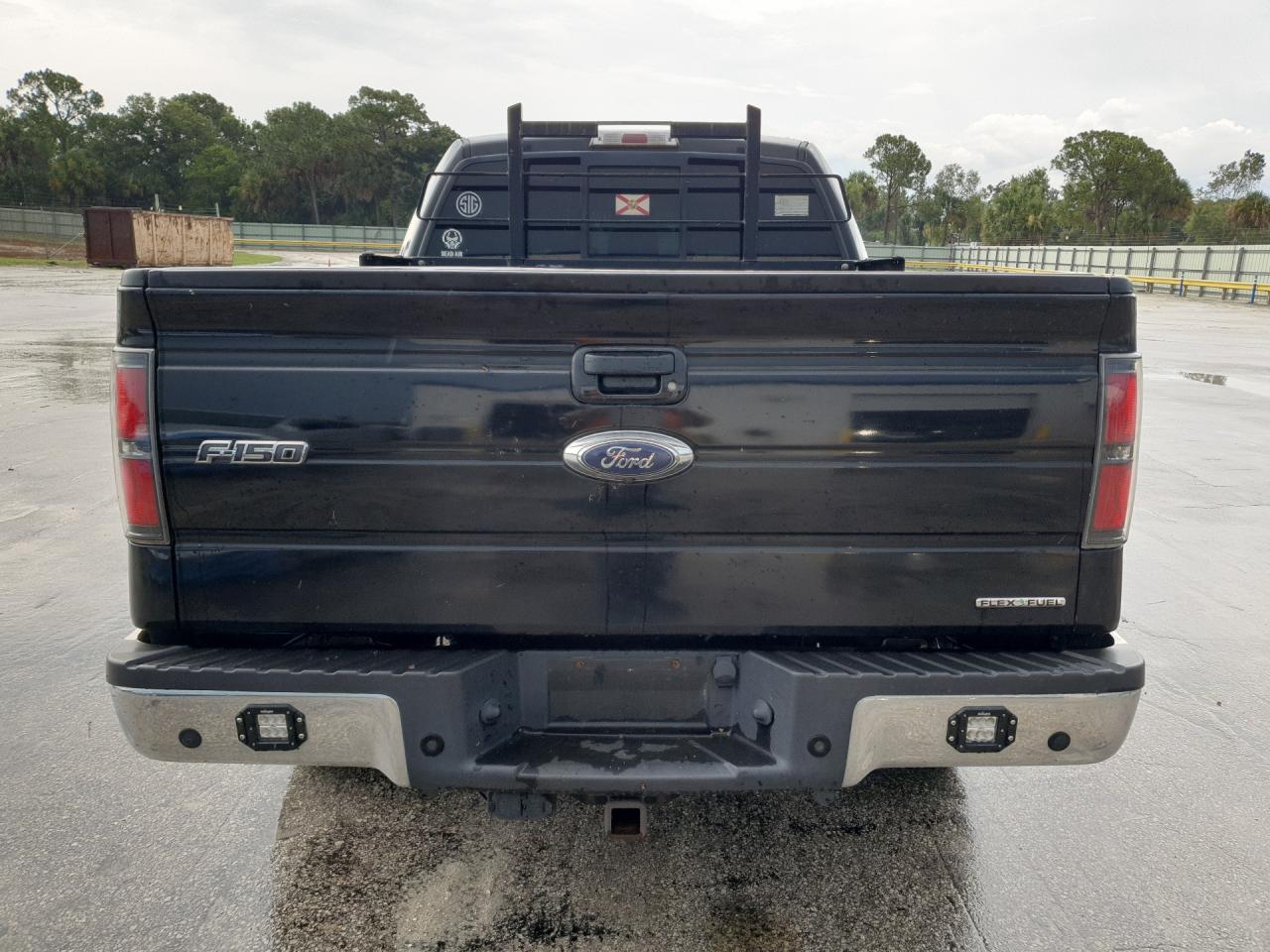 2014 Ford F150 Supercrew Black vin: 1FTFW1EF7EKF13673 Damage: Tailgate, Dent(S) W/No Paint Dmg, < 1/8 Inch