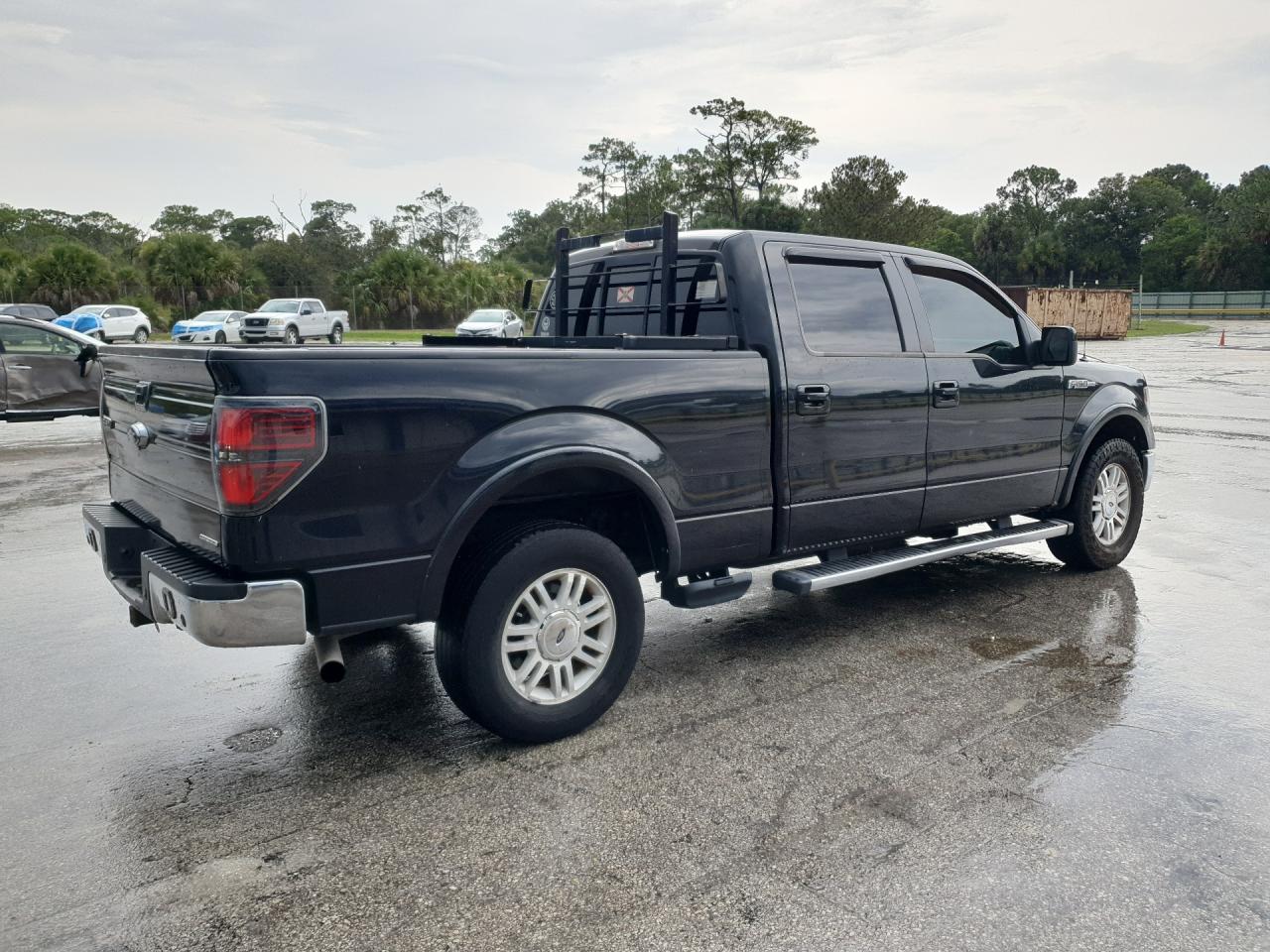2014 Ford F150 Supercrew Black vin: 1FTFW1EF7EKF13673 Damage: Right Rear Door, Dent(S) W/No Paint Dmg, < 1/8 Inch