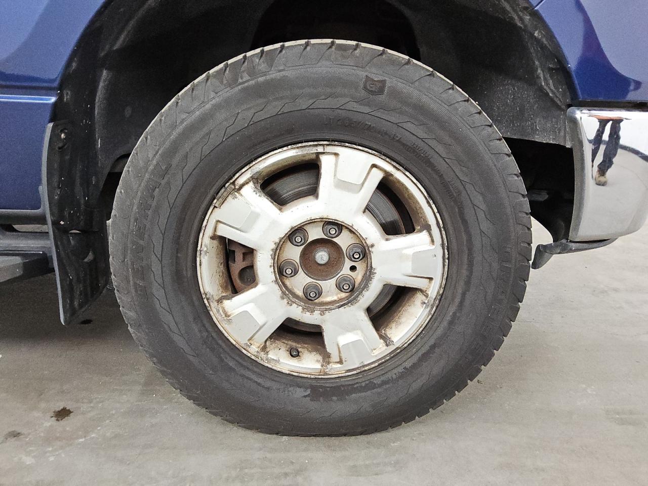 2012 Ford F150 Supercrew Blue vin: 1FTFW1EF8CFB75111 Damage: Right Front Center Cap, Missing, Replacement Required