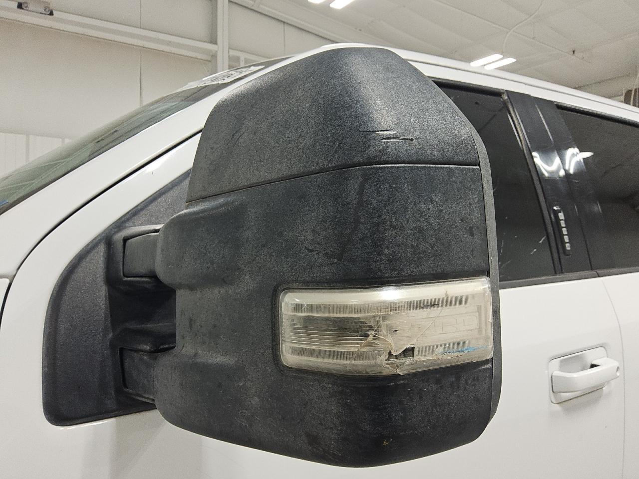 2015 Ford F150 Supercrew White vin: 1FTFW1EG8FKE76501 Damage: Left Front Mirror Signal Lamp, Broken, Replacement Required
