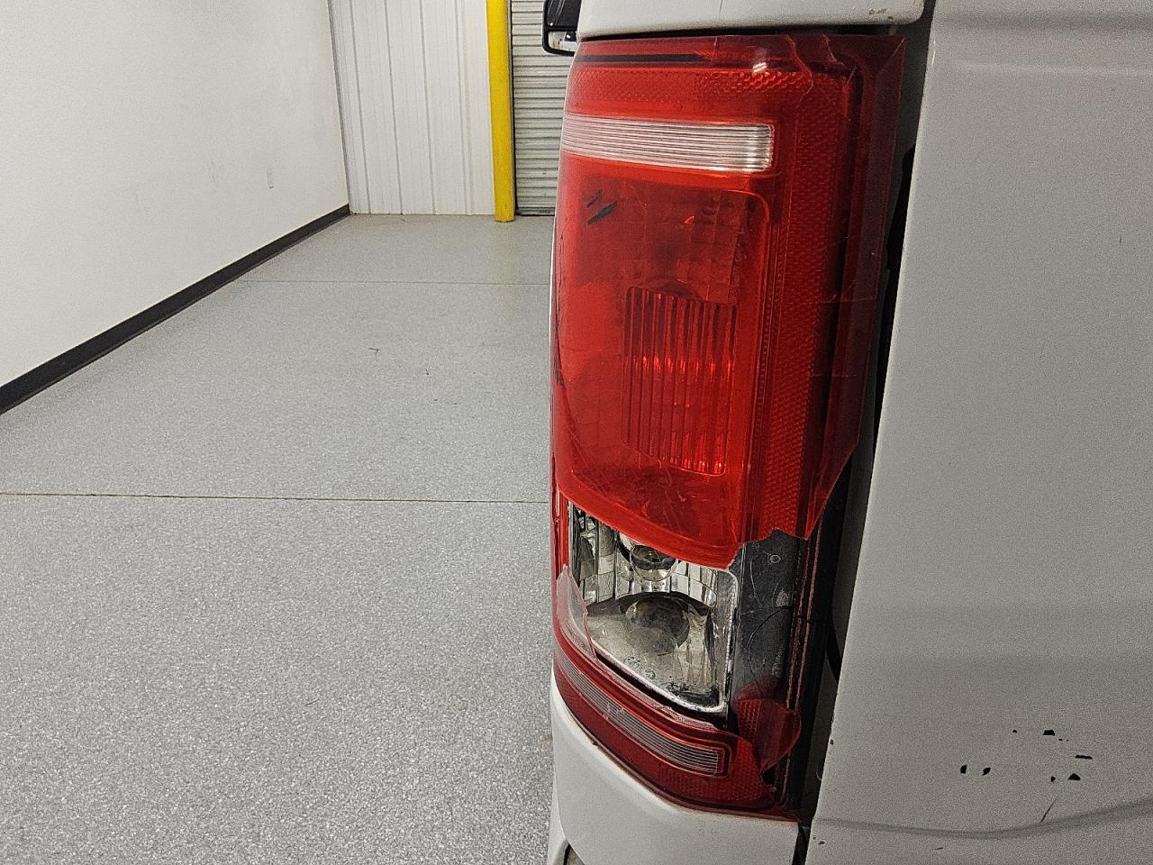 2015 Ford F150 Supercrew White vin: 1FTFW1EG8FKE76501 Damage: Left Tail Light, Broken, Replacement Required