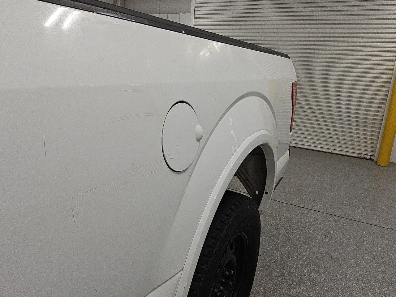 2015 Ford F150 Supercrew White vin: 1FTFW1EG8FKE76501 Damage: Left Bed Side, Heavy Scratch, 4 To 5 Inches