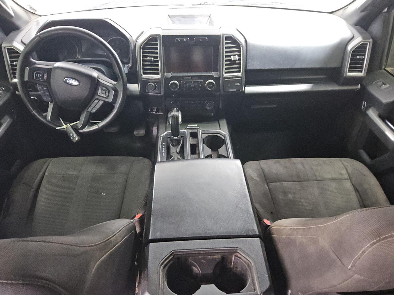 2015 Ford F150 Supercrew White vin: 1FTFW1EG8FKE76501 Damage: Right Front Seat, Burn Hole, 1/8 To 1/2 Inch
