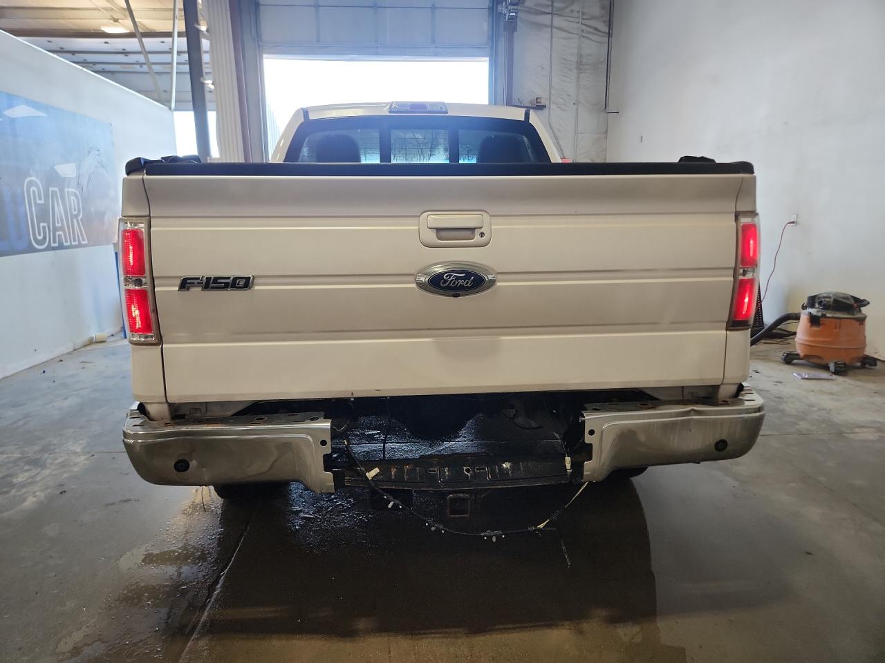 2011 Ford F150 Supercrew White vin: 1FTFW1ET1BFD39383 Damage: Rear Metal Bumper Chrome, Severe Damage, Replacement Required