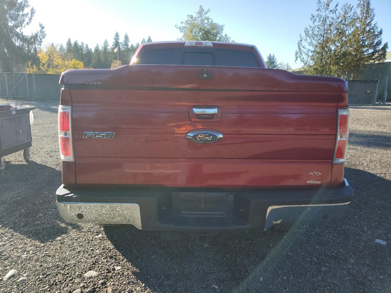 2013 Ford F150 Supercrew Red vin: 1FTFW1ET1DFB71196 Damage: Rear Metal Bumper Chrome, Severe Damage, Replacement Required