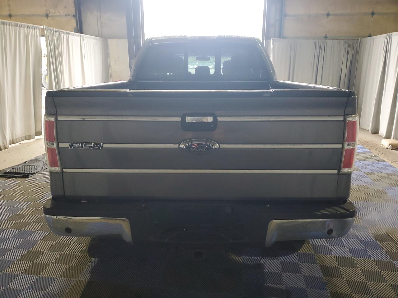 2013 Ford F150 Supercrew Charcoal vin: 1FTFW1ET4DKD96882 Damage: Rear Metal Bumper Chrome, Dent(S) W/No Paint Dmg, 5 To 6 Inches