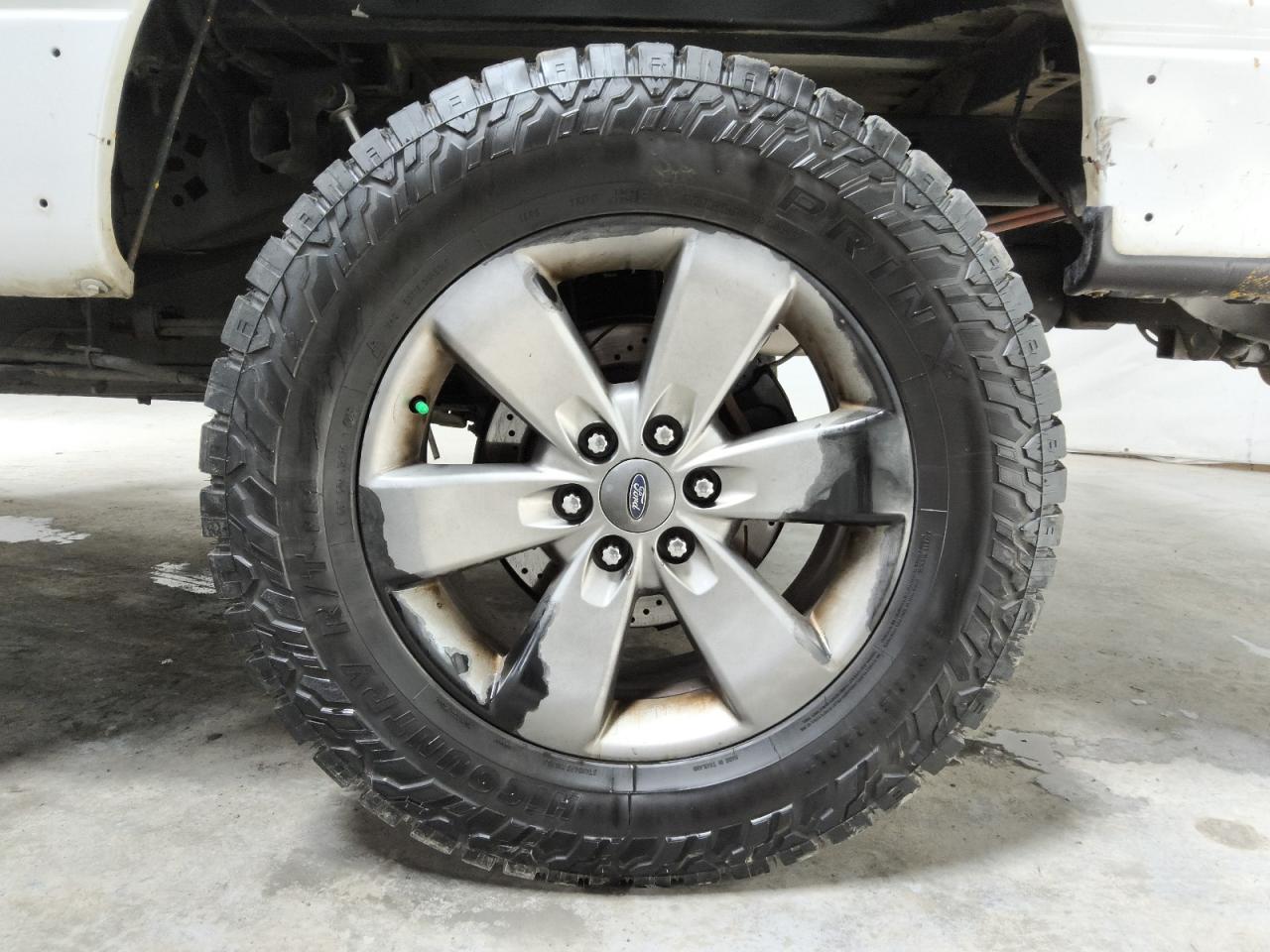 2013 Ford F150 Supercrew White vin: 1FTFW1ET8DKE32279 Damage: Left Rear Wheel, Corrosion, > 12 Inches