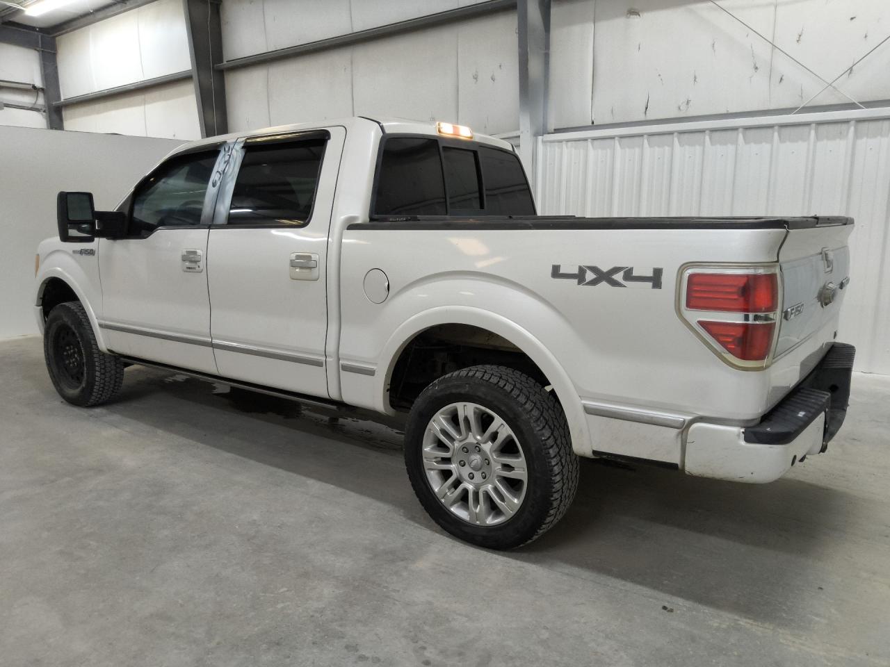 2010 Ford F150 Supercrew White vin: 1FTFW1EV3AFB44496 Damage: Left Fuel Door, Broken, Replacement Required
