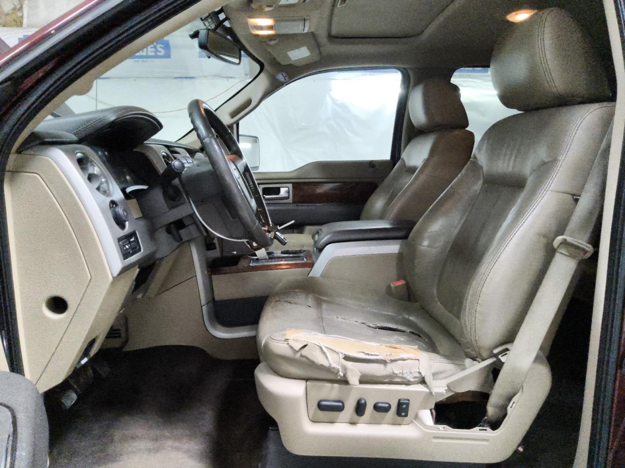 2010 Ford F150 Supercrew Maroon vin: 1FTFW1EV5AFB94283 Damage: Left Front Seat Cushion, Torn, > 12 Inches