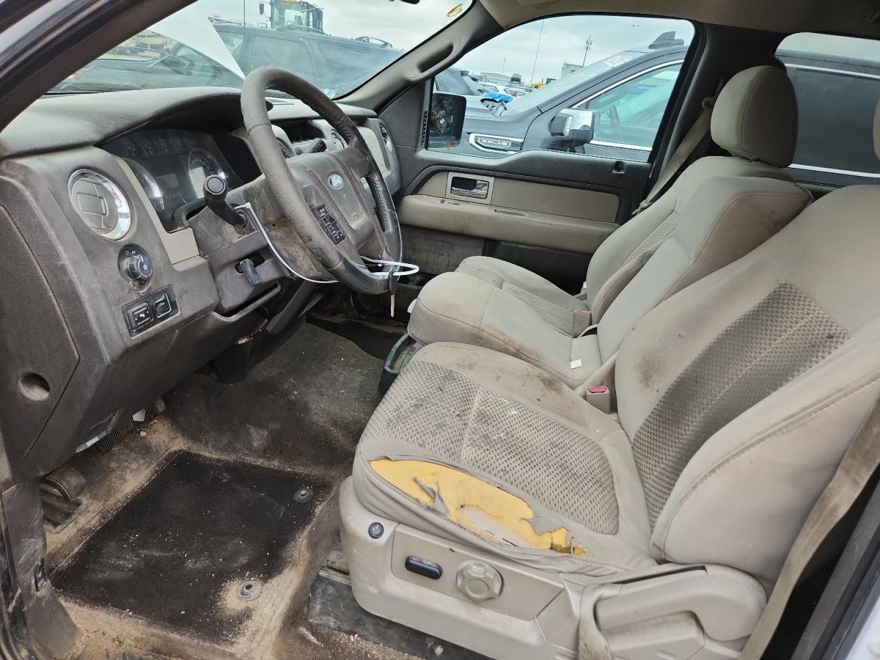 2010 Ford F150 Supercrew White vin: 1FTFW1EV6AFD33594 Damage: Left Front Seat Cushion, Worn, Replacement Required