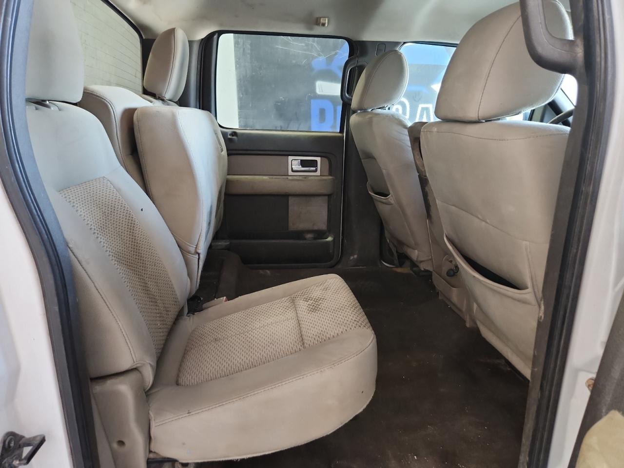 2010 Ford F150 Supercrew White vin: 1FTFW1EV6AFD33594 Damage: Right Rear Seat Cushion, Stained, Permanent
