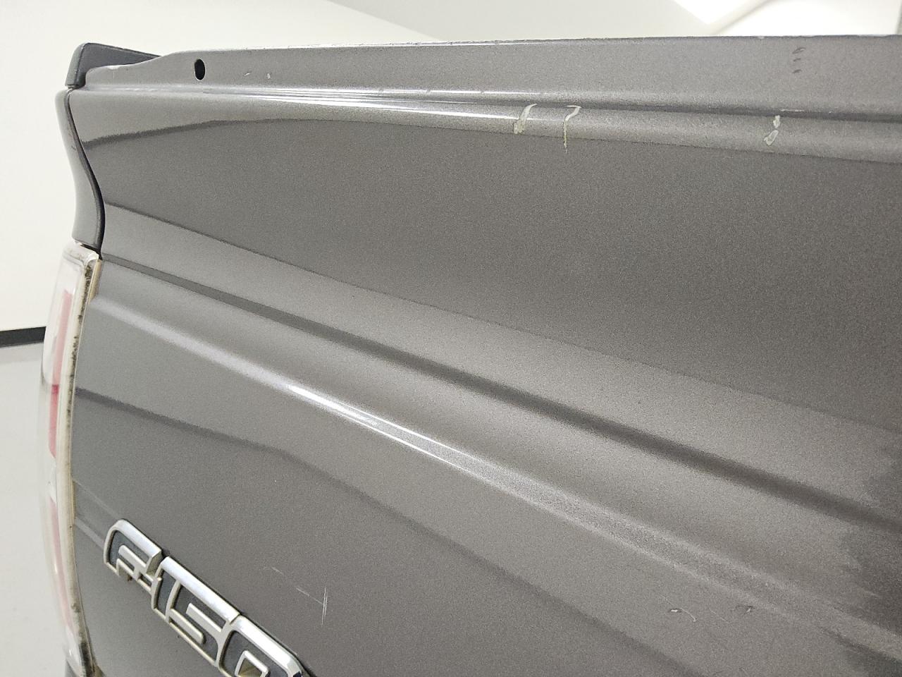 2014 Ford F150 Super Cab Gray vin: 1FTFX1CF5EKD28800 Damage: Tailgate, Heavy Scratch, 4 To 5 Inches