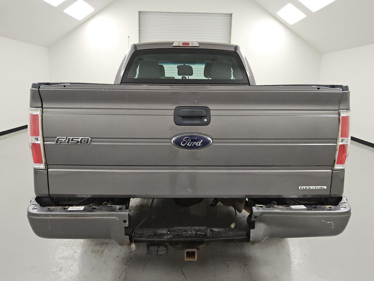 2014 Ford F150 Super Cab Gray vin: 1FTFX1CF5EKD28800 Damage: Rear Metal Bumper Painted, Dent(S) W/ Paint Dmg, 9 To 10 Inches