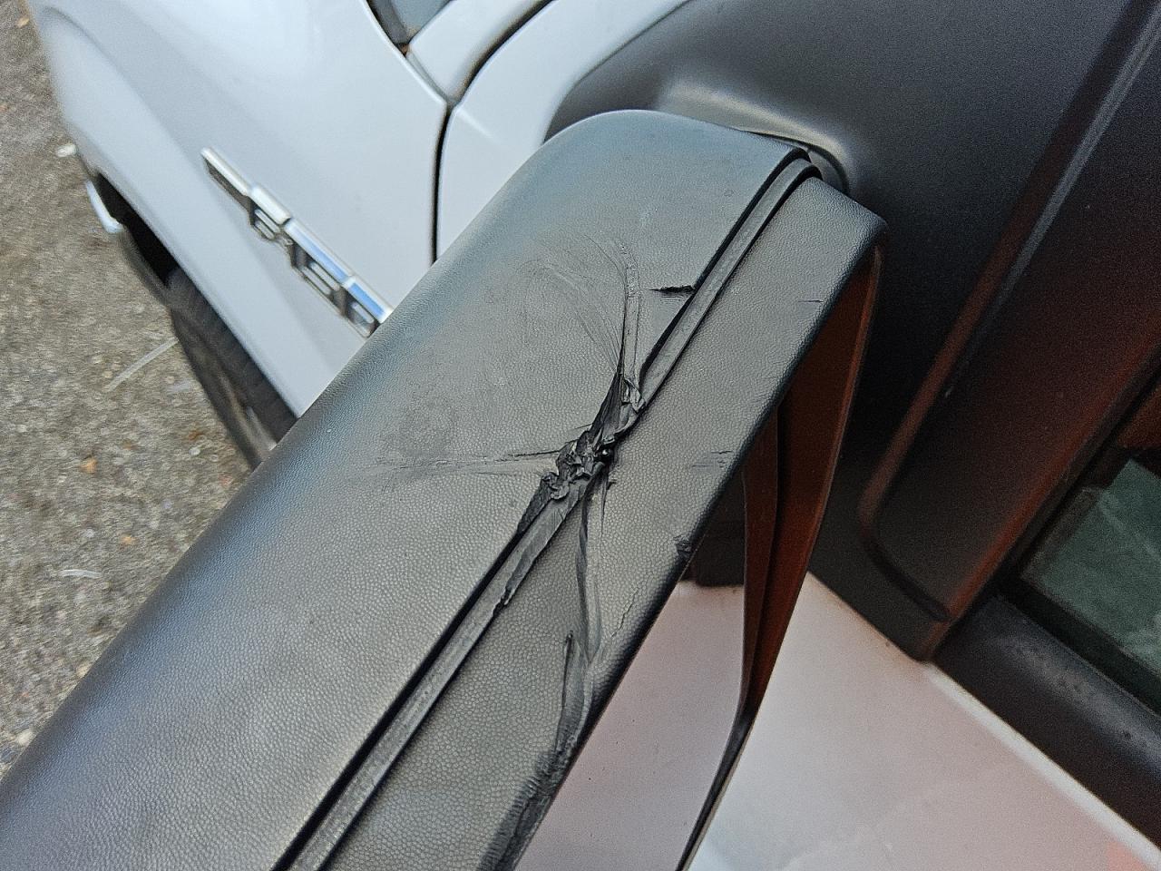 2014 Ford F150 Super Cab White vin: 1FTFX1CF6EKG22562 Damage: Left Mirror, Gouged, 7 to 8 inches